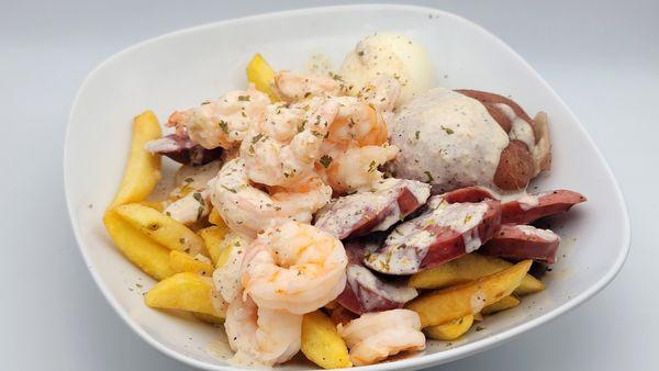 Chill Pack - Peeled boil shrimp with sausage, potato, boiled egg covered with our Creamy Garlic Sauce on a bed of crispy French Fries.