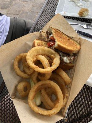 Wisconsin Philly with onion rings.