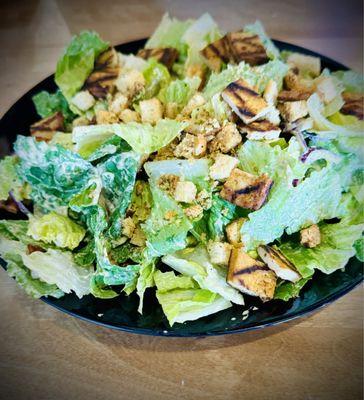 Caesar salad (Organic romaine, toasted garbanzo beans, nutritional yeast, & house made dressing & croutons + I added baked organic tofu)