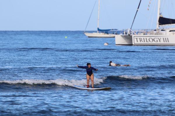 My wife riding her first wave of the day