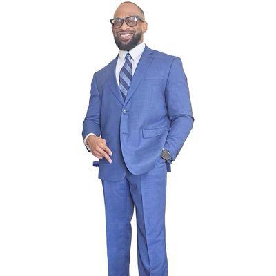 Blue suit with matching blue tie from Men's Mart as well. Also wearing a Mason Blue dress shirt.