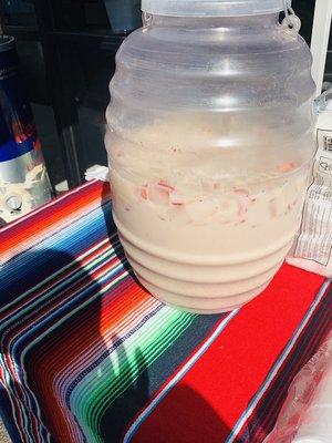 sabrosa   agua de horchata. and. strawberry.   mmm deliciosa.    natural