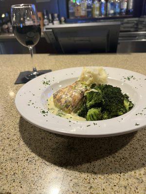 Salmon with leek cream sauce, garlic mash potatoes & broccoli. The sauce really makes the dish.