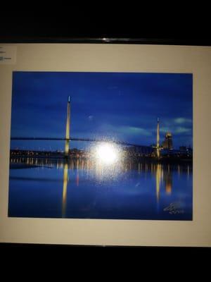 My must have item. Flash obscured. Night scene of pedestrian bridge a seen from Iowa aside