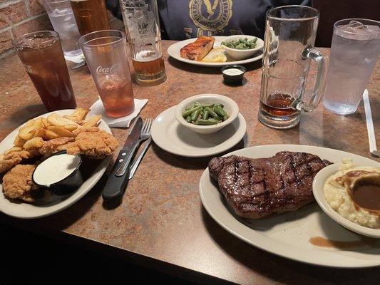 Delicious New York strip steak and salmon. Never leave disappointed.