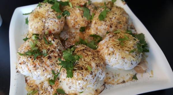 Dahi puri - an explosion of flavor in your mouth. Eat them fast before they get soggy/fall apart!