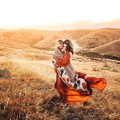 Mom and son maternity photo at sunset