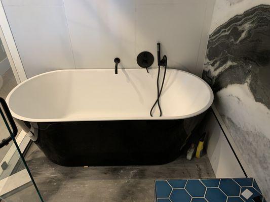 Install bathtub