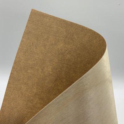 Wood! Birch papers. Its surface is genuine wood cut so thin it is nearly translucent. The smoothness of the wood allows it to be printable!