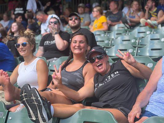 Team Kaizen members and family at a Cubs-Brewers game