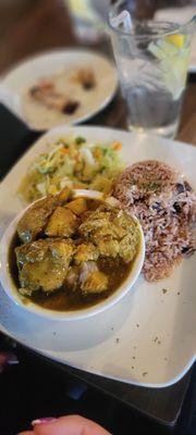 Curry chicken, cabbage and rice and peas