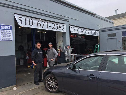 Malcolm and Sebastian in front of 1701 service bays