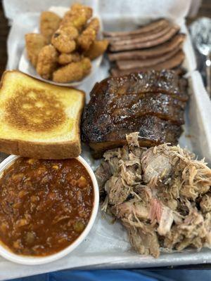 Brisket (pass), ribs (decent), pulled pork (juicy, great flavor). Corn nuggets (so good!), toast, Brunswick stew (pretty good).