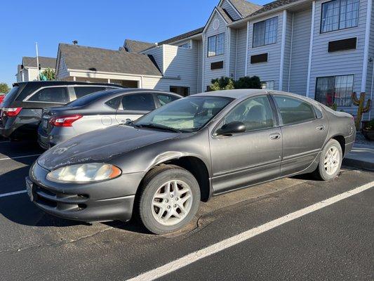 Here is the abandoned car that was asphalted  around when the parking lot was redone. Funny, right?