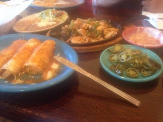 Chicken enchiladas & chicken fajitas.