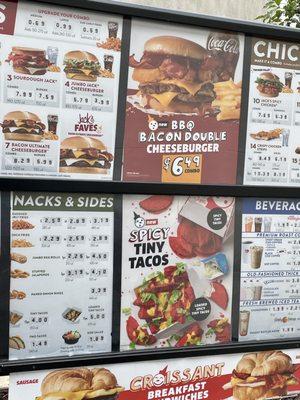 Drive thru menu promoting new Spicy Tiny Tacos and BBQ Bacon Double Cheeseburger