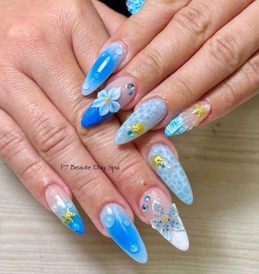 Mermaid blue ocean theme w/ 3D flower gel Apres Gel X nails. #geloverlay #hardgel #buildergel #shellacmani #gelmani #nailart #p7beautedayspa