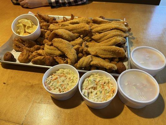 Chicken, shrimp, and catfish feast with coleslaw and okra