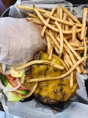 Cheeseburger and fries to go. Bun packed separately so it doesn't get soggy!