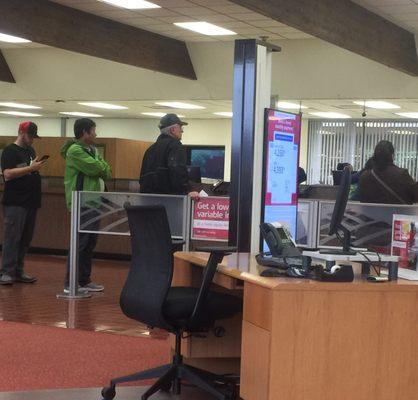 The line waiting for a teller is out the door at the bank and they only has two tellers working!!   Terrible customer service!