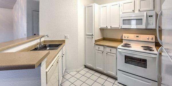 Kitchen Photo including Stove and Sink