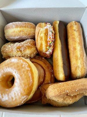 Raised Donuts, Cinnamon Roll, Chocolate and Maple Bars, and Butter Milk Plain Donut