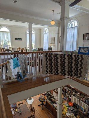 View of the upstairs tea room and the main floor shopping area.