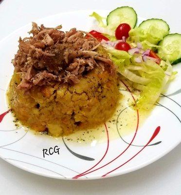 Mofongo- Mashed Plantains, filled with your choice of meat(Pork, Chicken)