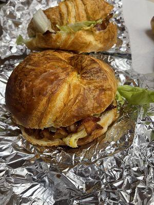 Bacon egg cheese croissant with avocado & lettuce.