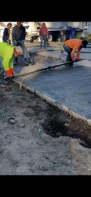 Screeding concrete