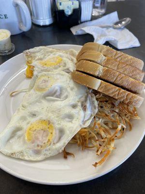 Eggs, toast and hash browns combo