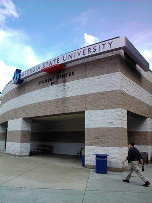 This is GSU's student center and someone with a purpose appears to be walking past it.