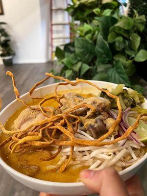 Khao Soi with children drumsticks