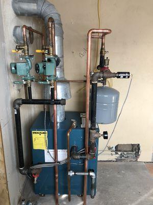 Standers Natural Gas Boiler reconnection on house lift project. New heating zones to existing boiler.