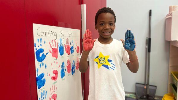 Our preschoolers are having a blast while learning how to count by 5s!