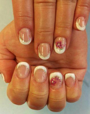 $16 for gel nails with decorated gel nail polish, hand massage, & parafin dip.