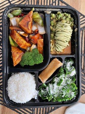 Bento Box with General Tso's Tofu as the main -- comes with Dan Dan Noodles, a Spring Roll, Rice and a Salad