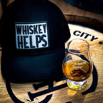 Sugar House Whiskey and hat on SHD Whiskey Barrel