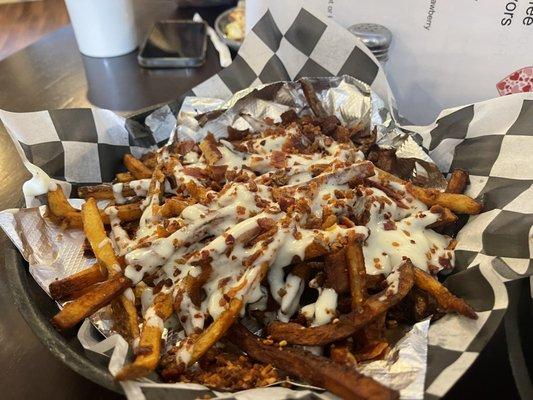 Loaded fries with there special cheese sauce