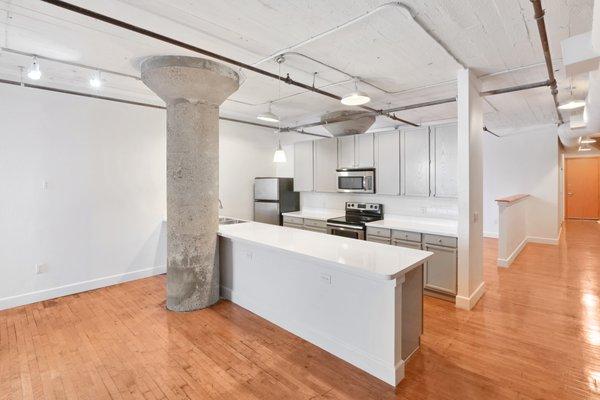 Modern kitchen with stainless steel appliances at South Side on Lamar