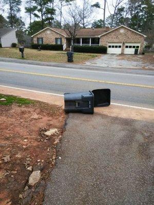 Trash can knocked over.