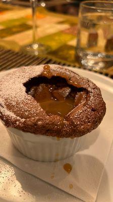 Chocolate soufflé with passion fruit sauce to finish the meal.