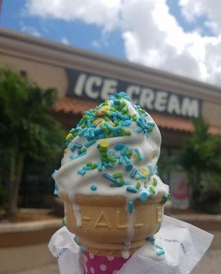 soft serve vanilla cone with sprinkles