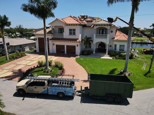 Siesta Roofing in progress of a full roof replacement in Fort Myers, Florida. 
This is a tile tear off and Worthouse install after.