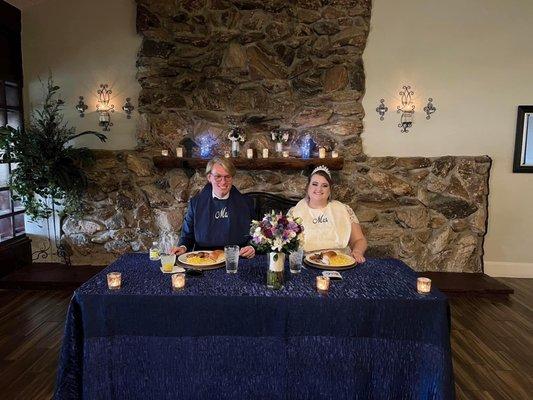 Bride/Groom table with beautiful fireplace