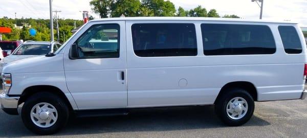 Brand New 14 Passenger Shuttle Seating Van with climate control privacy glass and ipod hook up.