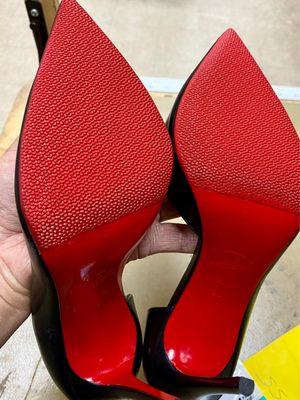 Women's Christian Louboutin shoe protectors