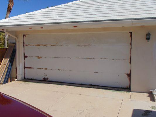 Before photo of garage door