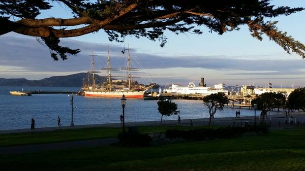 The Balclutha in the glow of sunset, Hyde street pier and aquatic park.