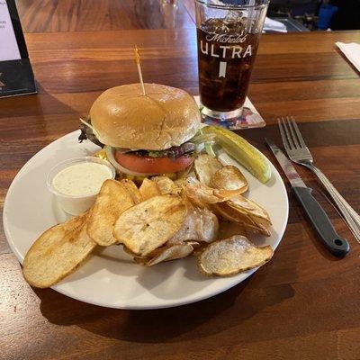 The Kentwood chicken sandwich, blackened with pub chips.